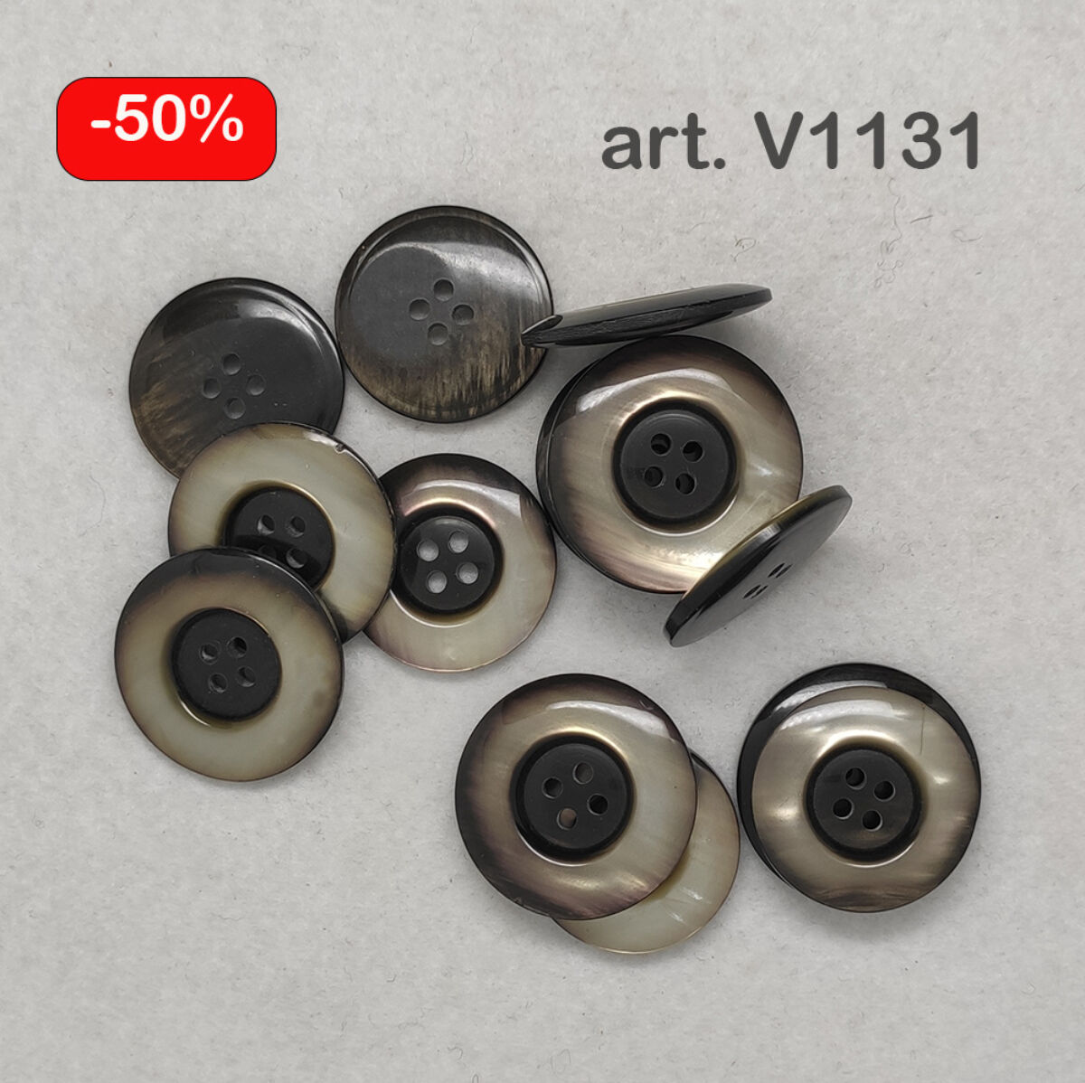 Bottone a quattro fori piatto anni 70