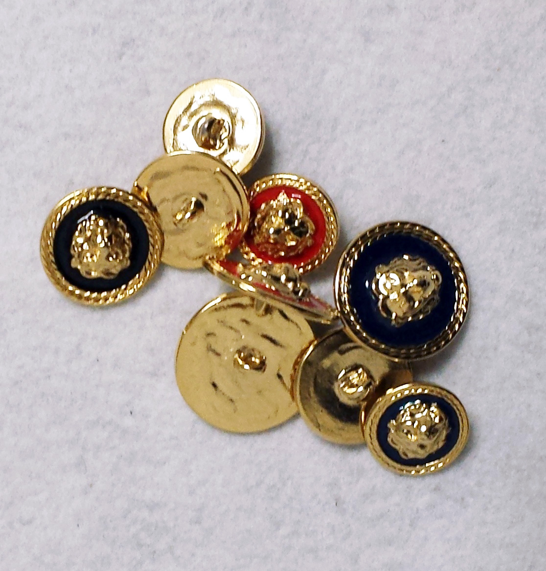 Bottone metallo con immagine a rilievo