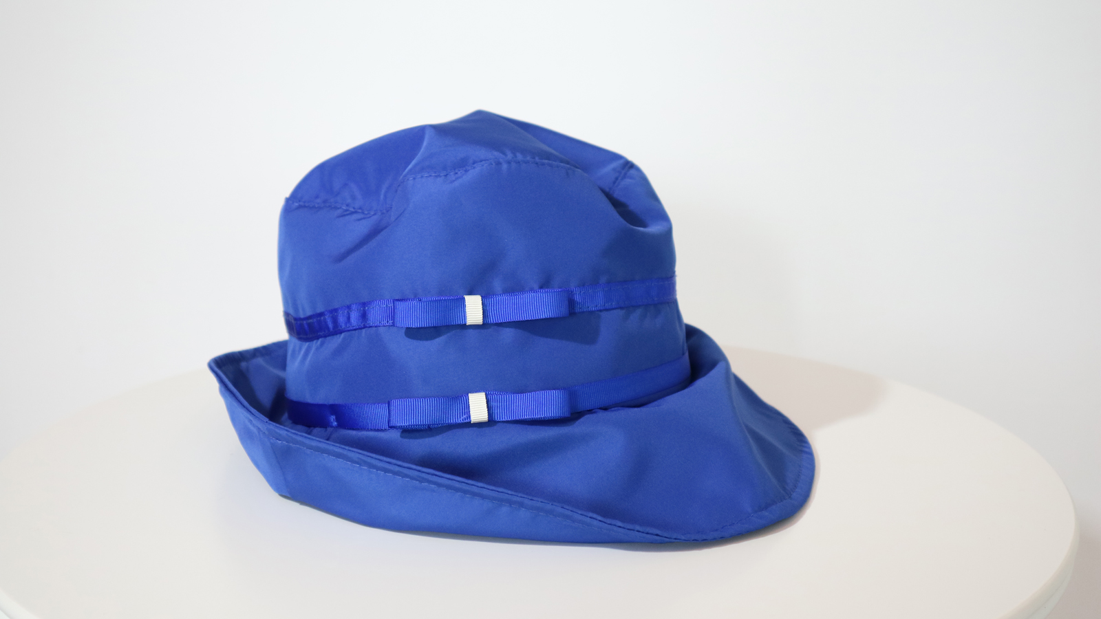 Cappello da pioggia Blu con fiocchetti - immagine 4