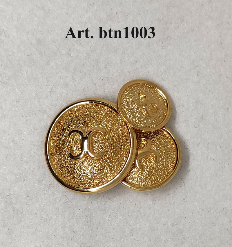 Bellissimo bottone con simbolo a rilievo - immagine 3