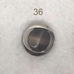 Bottone vintage di fine anni 70 - 36 - Diametro mm. 22.5 - spessore.  mm. 10.6/5.6